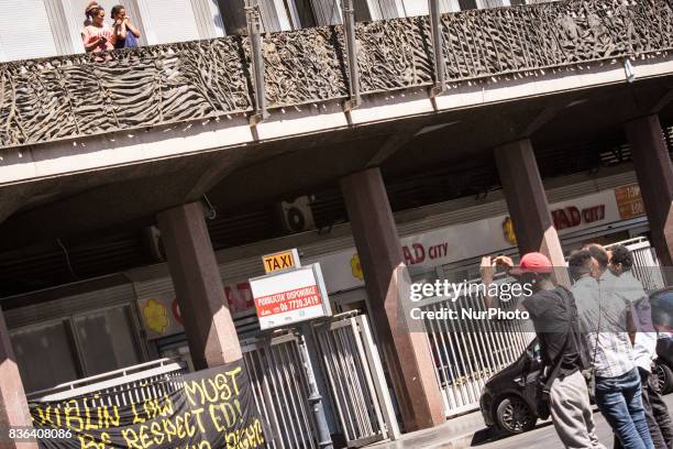 Evicted refugee with his personal items recovered from the vacated palace , in Piazza Indipedenza , by the police . The police let enter the palace 4...