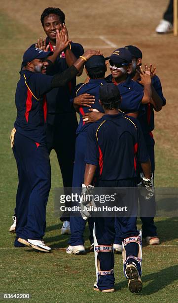 The Mubai XI celebrate their victory against England after the 2ND match of the winter Tour of India played at The Brabourne Stadium on November 11...