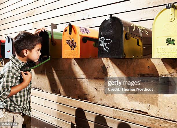 boy checking for mail - seattle open stock pictures, royalty-free photos & images