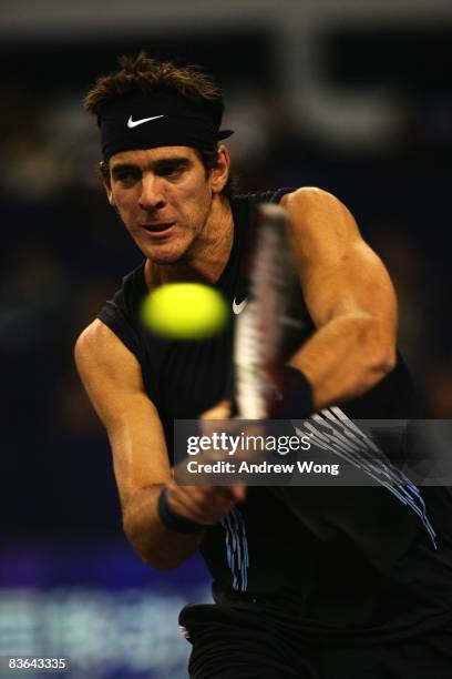 Juan Martin Del Potro of Argentina returns a shot during his round robin match against Jo-Wilfried Tsonga of France in the Tennis Masters Cup held at...