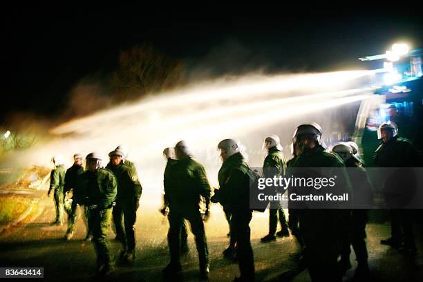 German riot police breaks up a meeting by activists protesting against the tranportation of nuclear waste on November 9, 2008 in Metzingen near...