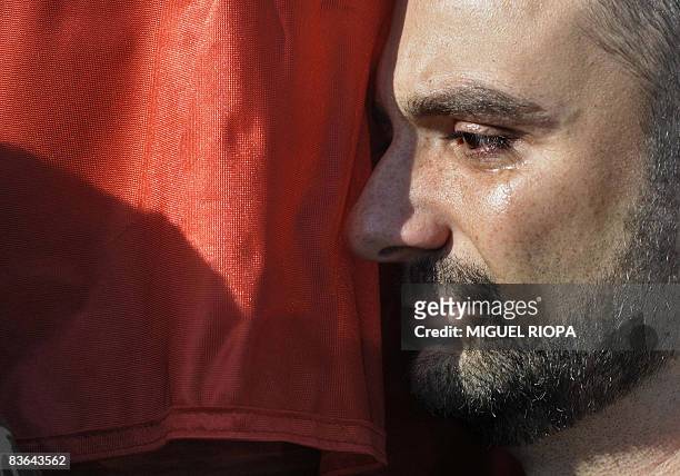 Spanish soldier cries on November 11, 2008 as he carries one of the coffins of Ruben Alonso Rios and Juan Andres Suarez Garcia, the two Spanish...