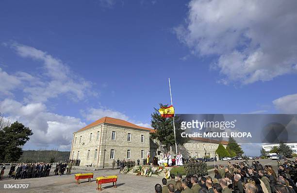 People attend the funeral mass of the two Spanish soldiers killed in a Taliban suicide attack in Afghanistan, Ruben Alonso Rios and Juan Andres...
