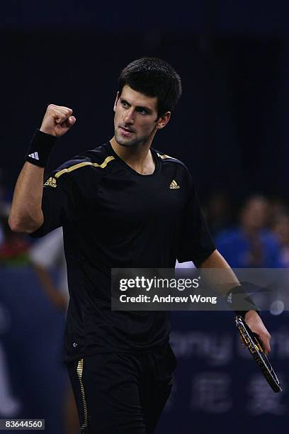 Novak Djokovic of Serbia celebrates winning his round robin match against Nikolay Davydenko of Russia in the Tennis Masters Cup held at Qi Zhong...