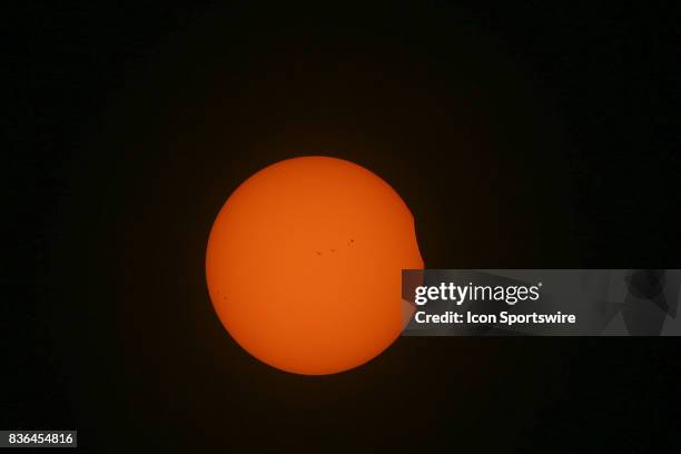 The Moon is seen passing in front of the Sun during a Solar Eclipse on August 21, 2017 at Roxbury High School in Roxbury, NJ. A total solar eclipse...