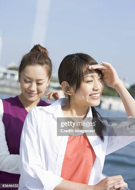 friends - woman smiling facing down stock pictures, royalty-free photos & images