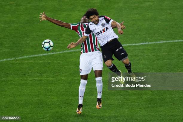 Léo Pelé of Fluminense struggles for the ball with Luan of Atletico MG during a match between Fluminense and Atletico MG part of Brasileirao Series A...