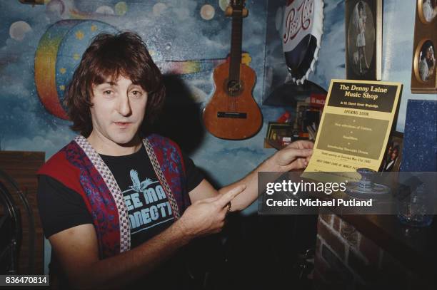 English singer-songwriter, and former Wings and Moody Blues guitarist, Denny Laine shows his memorabilia, including a leaflet of 'The Denny Laine...