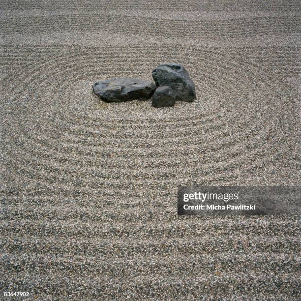 rock and sand pattern in zen garden - rock garden stock pictures, royalty-free photos & images