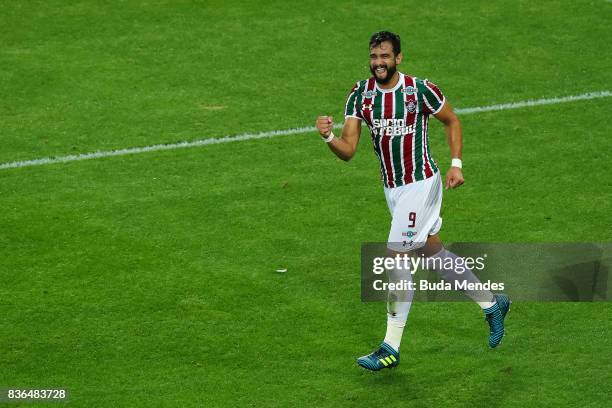 Henrique Dourado of Fluminense celebrates a scored goal against Atletico MG during a match between Fluminense and Atletico MG part of Brasileirao...