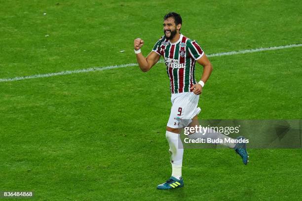 Henrique Dourado of Fluminense celebrates a scored goal against Atletico MG during a match between Fluminense and Atletico MG part of Brasileirao...