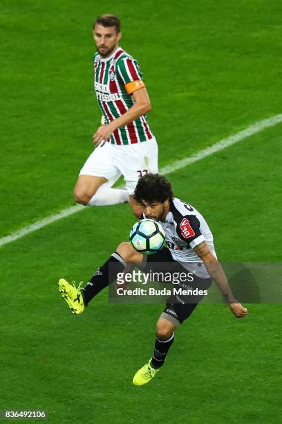 Henrique of Fluminense struggles for the ball with Luan of Atletico MG during a match between Fluminense and Atletico MG part of Brasileirao Series A...