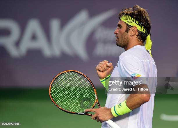 Malek Jaziri of Tunisia reacts after a point against Taylor Fritz during the third day of the Winston-Salem Open at Wake Forest University on August...