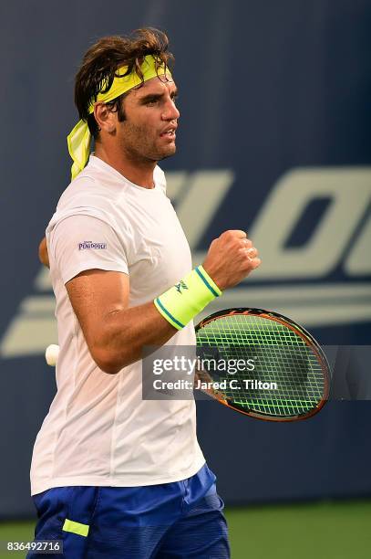 Malek Jaziri of Tunisia reacts after a point against Taylor Fritz during the third day of the Winston-Salem Open at Wake Forest University on August...