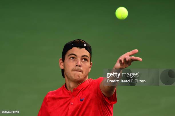 Taylor Fritz serves to Malek Jaziri of Tunisia during the third day of the Winston-Salem Open at Wake Forest University on August 21, 2017 in Winston...