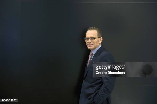 Andrew Mackenzie, chief executive officer of BHP Billiton Ltd., poses for a photograph at the company's headquarters in Melbourne, Australia, on...