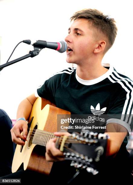 Kiaran Crook of The Sherlocks performs live and signs copies of their debut album 'Live for the Moment' during an instore session at HMV Manchester...