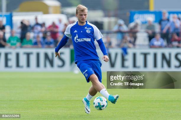 Johannes Geis of Schalke controls the ball during a training session at the FC Schalke 04 Training center on July 5, 2017 in Gelsenkirchen, Germany.