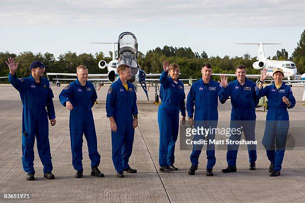Space Shuttle Endeavour STS-126 crew members, mission specialist Donald Pettit, pilot Eric Boe, Commander Christopher Ferguson, and mission...