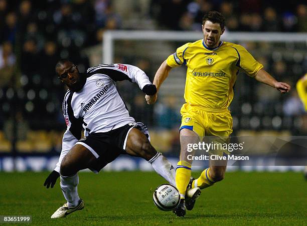 Nathan Ellington of Derby County is challenged by Frazer Richardson of Leeds United duing the Carling Cup Fourth Round match between Derby County and...