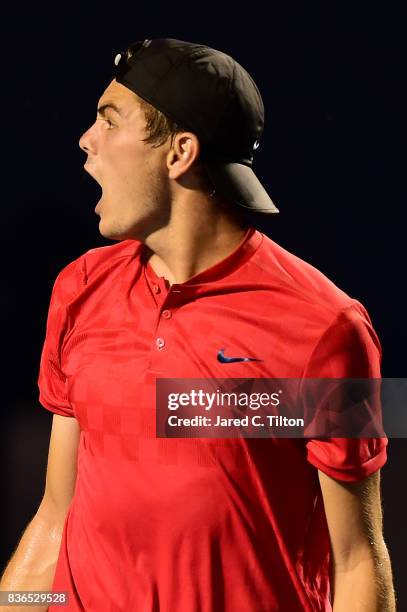 Taylor Fritz reacts after defeating Malek Jaziri of Tunisia during the third day of the Winston-Salem Open at Wake Forest University on August 21,...