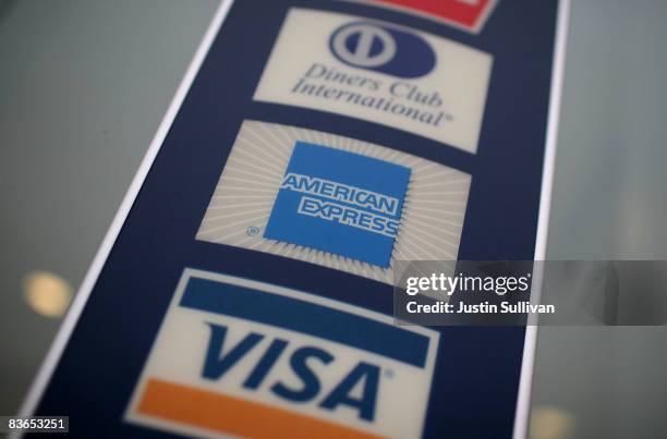 Sign showing the American Express logo is seen outside of a bank November 11, 2008 in Des Plaines, Illinois. American Express won federal approval to...