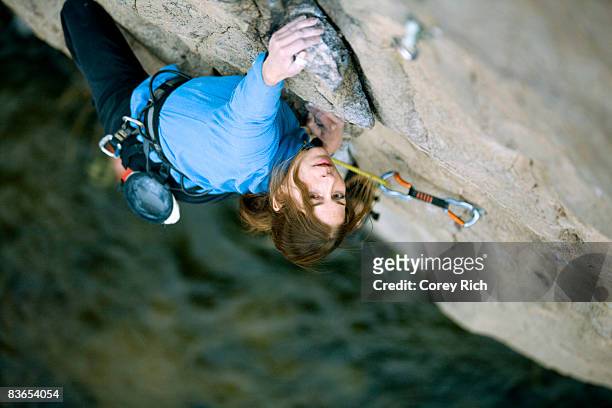 woman climbing above river - bishop foto e immagini stock