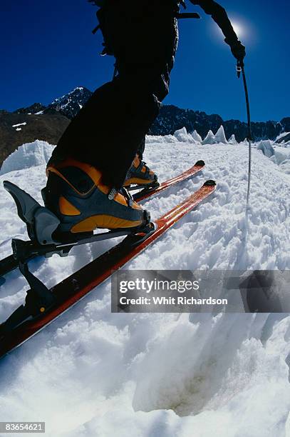 ski touring through ice penitentes - penitentes stockfoto's en -beelden