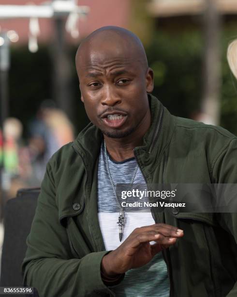 Akbar Gbaja-Biamila visits "Extra" at Universal Studios Hollywood on August 21, 2017 in Universal City, California.