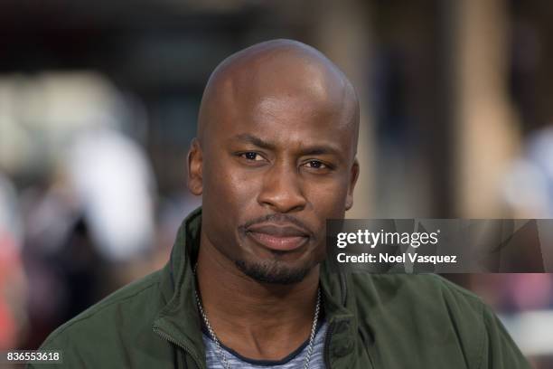 Akbar Gbaja-Biamila visits "Extra" at Universal Studios Hollywood on August 21, 2017 in Universal City, California.