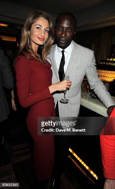 Designer Ozwald Boateng and wife Guynel attend the 10th anniversary party of Claridge's Bar November 11, 2008 in London, England.