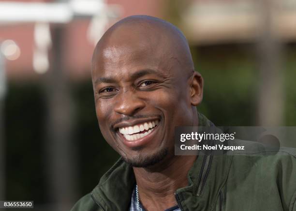 Akbar Gbaja-Biamila visits "Extra" at Universal Studios Hollywood on August 21, 2017 in Universal City, California.