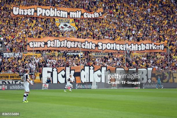 Fans of Dresden with a banner during the Second Bundesliga match between Dynamo Dresden and SV Sandhausen at DDV-Stadion on August 19, 2017 in...