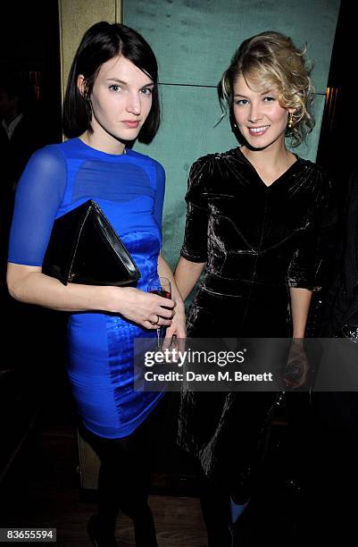 Model Ben Grimes and actress Rosamund Pike attend the 10th anniversary party of Claridge's Bar November 11, 2008 in London, England.