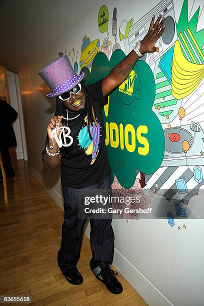Rap artist T-Pain poses for pictures after visiting MTV's "TRL" with VJ Damien Fahey at the MTV studios in Times Square on November 11, 2008 in New...