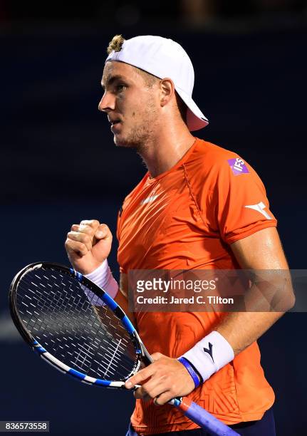 Jan-Lennard Struff of Germany reacts after a point against Pablo Cuevas of Uruguay during the third day of the Winston-Salem Open at Wake Forest...