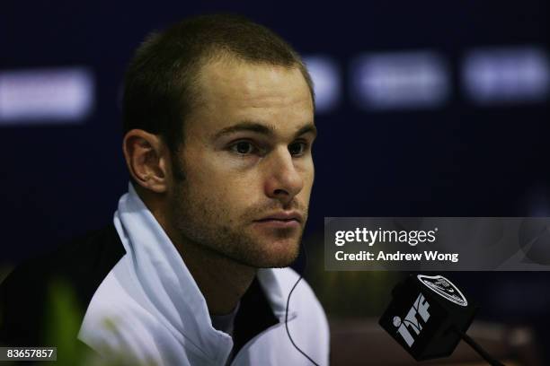 Andy Roddick of the United States announces his withdrawal from the Tennis Masters Cup because of a right ankle injury during a news conference at Qi...