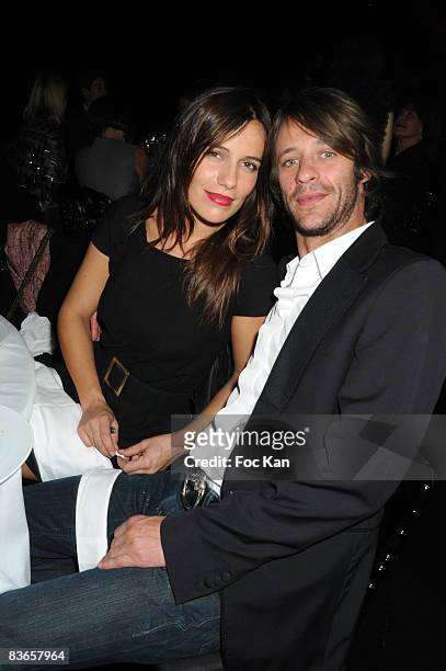 Zoe Felix and Benjamin Rolland attend the Sonia Rykiel Paris Fashion Week Spring/Summer 09 at the Parc de St Cloud on October 01, 2008 in Paris,...