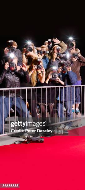 side view of paparazzi behind railings - european film premiere inside arrivals stock pictures, royalty-free photos & images