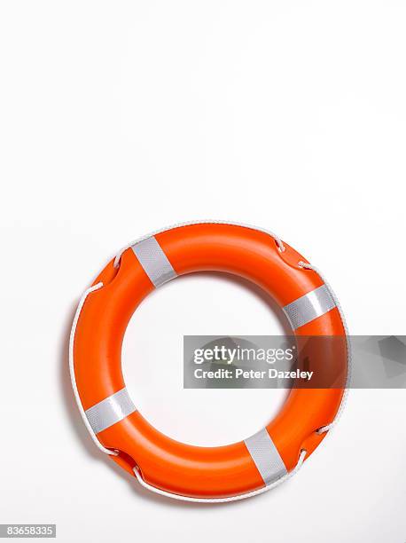 overhead shot of life-belt on white background - man made object - fotografias e filmes do acervo