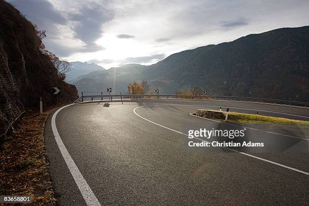 very curvey road - hairpin curve stock pictures, royalty-free photos & images