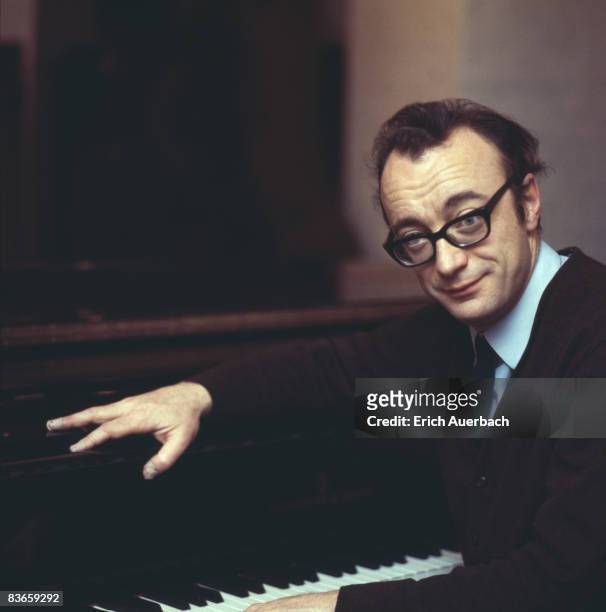 Austrian pianist Alfred Brendel at the piano, circa 1970.