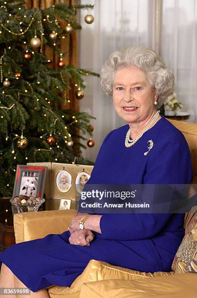 The Queen making her traditional Christmas broadcast to the Commonwealth from Buckingham Palace on December 25, 2001