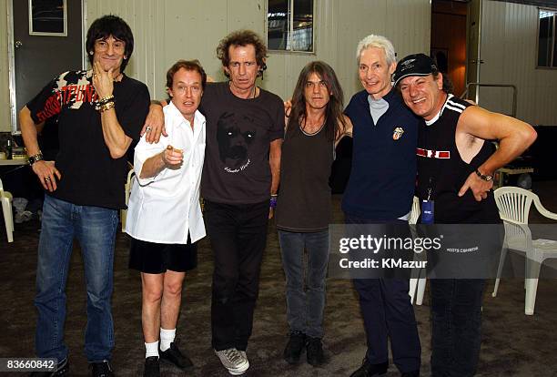 Ronnie Wood of The Rolling Stones, Angus Young of AC/DC, Keith Richards of The Rolling Stones, Malcolm Young of AC/DC, Charlie Watts of The Rolling...