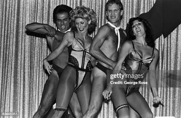 Racy and nearly naked dancers entertain the guests attending the 1980 Hollywood, California, Adult Entertainment Awards held at the Palladium.