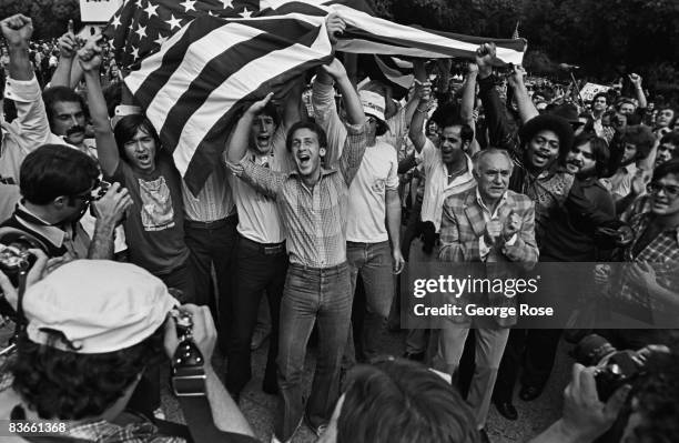 Crowd of demonstrators gathers on Wilshire Boulevard to protest the overthrow of the Shah of Iran in the Iranian Revolution, Beverly Hills,...