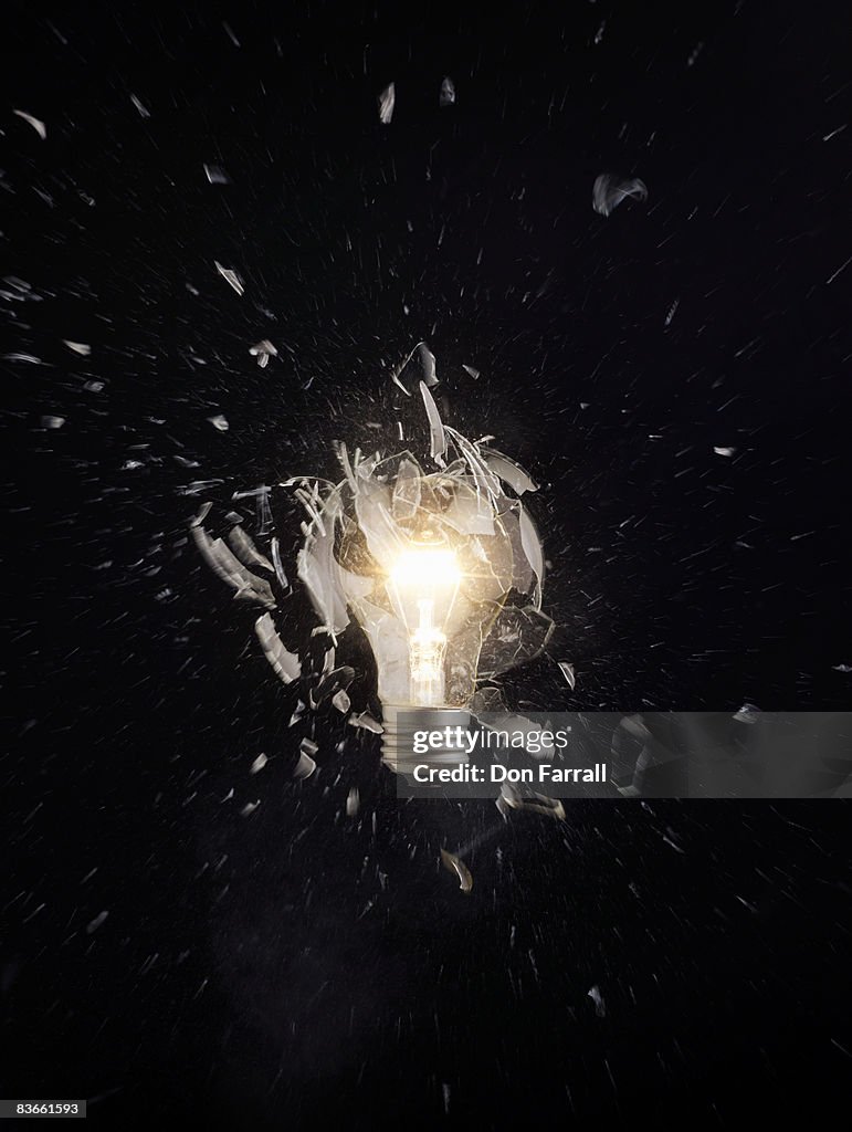 Exploding Lit Light Bulb High-Res Stock Photo - Getty Images