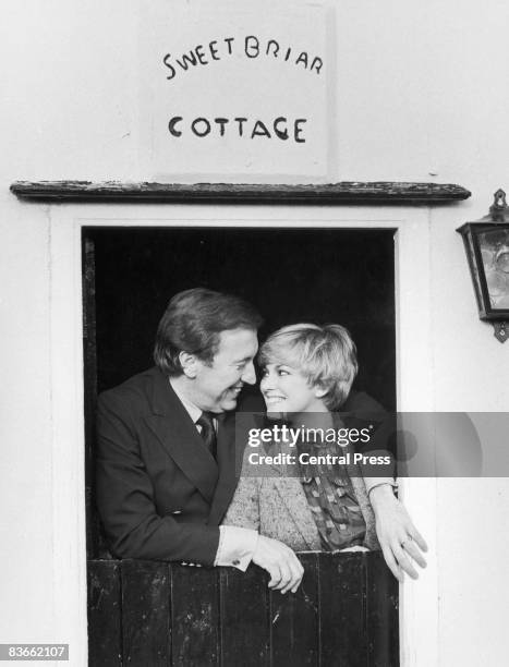 English broadcaster and satirist David Frost with his first wife, English actress Lynne Frederick after their wedding night at Frost's rural retreat,...