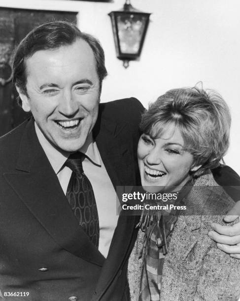 English broadcaster and satirist David Frost with his first wife, English actress Lynne Frederick after their wedding night at Frost's rural retreat,...