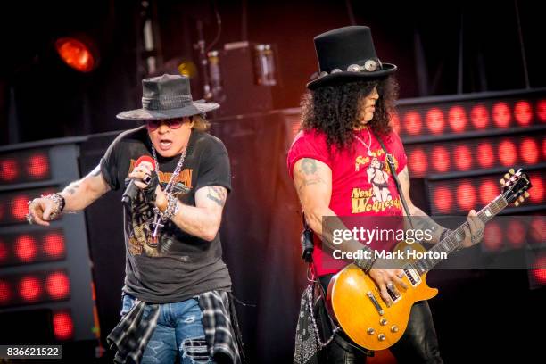 Axl Rose and Slash of Guns N' Roses perform onstage during the 'Not In This Lifetime' Tour at TD Place Stadium on August 21, 2017 in Ottawa, Canada.